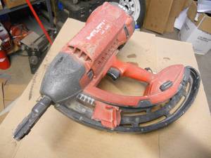 lot 137 image: Hilti GX100 Concrete or Steel Nail Driver - see pics, needs TLC