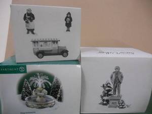 lot 114 image: Snow Village items - Waterfall, Popcorn Vendors, Mark Twain