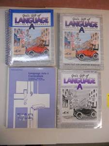 lot 184 image: Homeschool Books Christian Schools Language A Series - Gods Gift of Language A - Writing and Grammer Book, Teachers Edition, and Teacher Test Key (All unused). Also Curriculum Planner (May have some check marks)