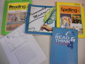 lot 187 image: Homeschool Books Read & Think Skill Sheets 4 - Unused, and Spelling, Reading, and Penmanship Mastery Workbooks - All with a few pages completed or missing and Name written on it.