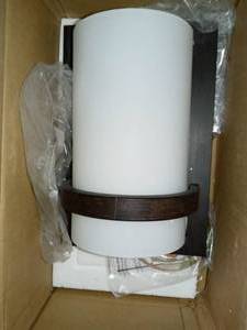 lot 6 image: 1-Light Iron Oxide Sconce by Minka Lavery- open box not used
