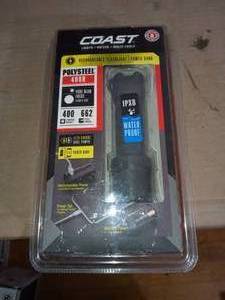 lot 48 image: Polysteel 400R 400 Lumen Rechargeable Waterproof LED Flashlight with Twist Focus by Coast- not used