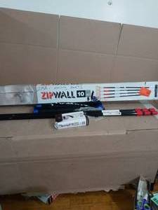 lot 81 image: ZP4 Contains 4 10 ft. Steel Spring by Zipwall - open box missing parts