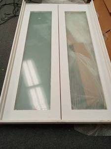 lot 101 image: Balcony doors 49x81- open box not used