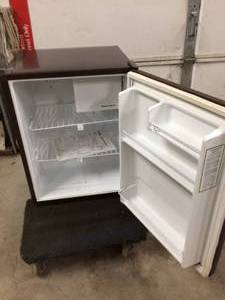 lot 27 image: Kenmore Model No. 564.9932541 Wood Grain Compact Refrigerator - Great Clean Working Condition