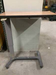 lot 90 image: HILL-ROM 630 OVERBED TABLE WALNUT Wood Grain Top - Good Working Condition - Small chip on edge