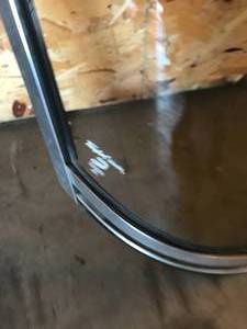 lot 28 image: Windshield and Wave Wacker Guards from 2000 Smoker Craft Boat