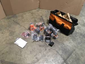 lot 2 image: Ridgid 18V Lithium-Ion Cordless 3-Tool Combo Kit with (2) 2.0 Ah Lithium-Ion Batteries, Charger, and Bag open box not used see pictures