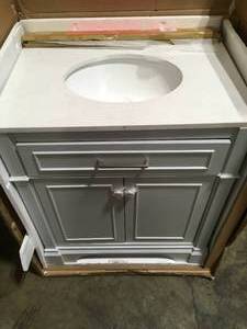 lot 18 image: Home Decorators Melpark 30 in. W x 22 in. D Bath Vanity in White with Cultured Marble Vanity Top in White with White Sink not used