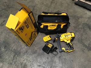 lot 14 image: Dewalt 20-Volt MAX XR Lithium-Ion Cordless 18-Gauge Flooring Stapler with Battery 4Ah, Charger and Contractor Bag see pictures