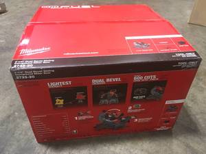 lot 27 image: Milwaukee M18 FUEL 18-Volt Lithium-Ion Brushless Cordless 7-14 in. Dual Bevel Sliding Compound Miter Saw (Tool-Only) not used see pictures