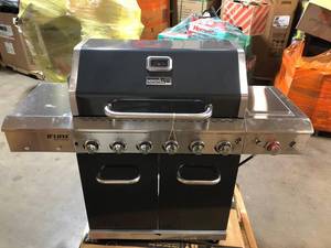 lot 54 image: Nexgrill Evolution 5-Burner Propane Gas Grill in Black with Side Burner and Infrared Technology whit small damage please review the pictures
