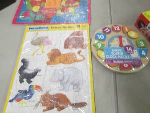 lot 101 image: 5 Puzzle Patch Puzzles, Clock Puzzl...
