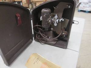 lot 231 image: Bell & Howell 8mm Projector...