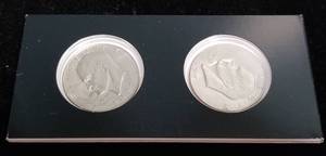 2 EISENHOWER DOLLARS IN BLACK PACKAGING