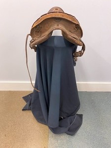 lot 54 image: Vintage Saddle with Stirrups