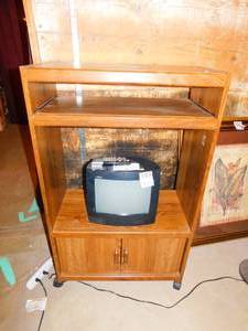 lot 193 image: RCA TV with Remote and Stand