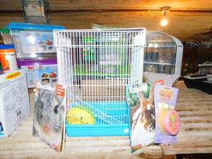 lot 145 image: Bird Cage  Chinchillas & Rabbit Manuals  Critter Puffs Mineral Meals