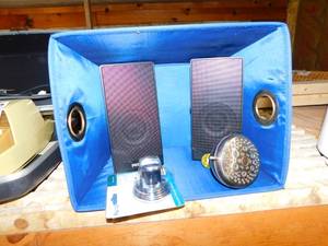 lot 109 image: Suction Shower Mount  Simply Clean Shower Head  2 Philips Speakers  Blue Basket