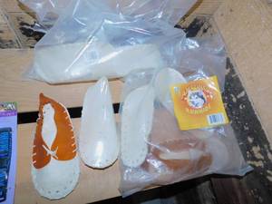 lot 38 image: Amazing New Rawhide Chew Shoes