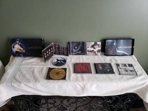 lot 30 image: Garth Brooks, Motley Crew, C. Willi Myles CDs