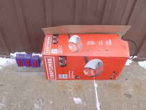 lot 4 image: Chamberlain 12 hp garage door opener with misc craftsman parts. Used condition. Unable to fully test. As shown.