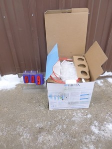 lot 9 image: Brita under sink water filtration system. Appears complete. Unable to test. As shown.