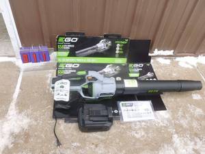 lot 11 image: E-Go 56 volt cordless blower. Appears new with charger. No battery included. As shown.