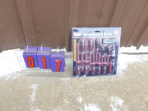 lot 17 image: Flat on new screwdriver. New in box. As shown.