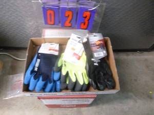 lot 23 image: Flat of new gloves. As shown.