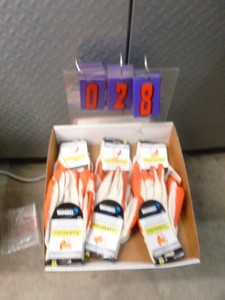 lot 28 image: Flat of new gloves. As shown.