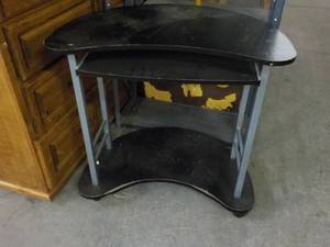 lot 38 image: Black Curved Metal and Wood Desk...
