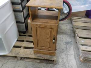 lot 51 image: Wood 1 Door Cabinet 13 x 12 x 27...