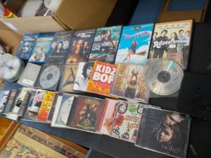 lot 77 image: DVDs and CDs...