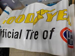 lot 93 image: Goodyear Tire Banner and Tools...