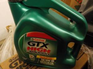 lot 240 image: 1 Gallon GTX High Milage SAE10W-40 ...