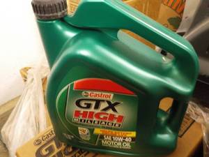lot 242 image: 1 Gallon GTX High Milage SAE10W-40 ...