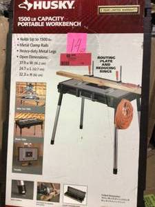 lot 14 image: 1.8 ft. x 3 ft. Portable Jobsite Workbench by Husky in good condition 