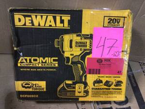 lot 47 image: ATOMIC 20-Volt MAX Lithium-Ion Brushless Cordless Compact 14 in. Impact Driver with 2 Batteries 1.3 Ah Charger and Bag by DEWALT in good condition 