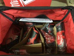 lot 71 image: Milwaukee 2498-25 M12 12-Volt Lithium-Ion Cordless Combo Kit (5-Tool) with (2) 1.5Ah Batteries, Charger and Tool Bag in good condition 