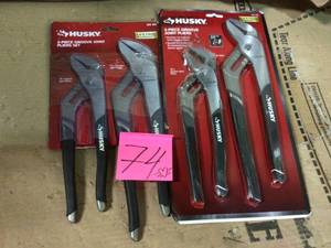 lot 74 image: 10 in. and 12 in. Groove Joint Pliers Set by Husky in good condition 