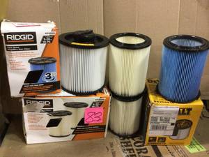 lot 83 image: MIX LOT OF 6 Gal. to 16 Gal. Cartridge Filter for Regular for WetDry Vacuum by DEWALT  & 3-Layer Fine Dust Pleated Paper Filter for Most 5 Gal. and Larger RIDGID WetDry Shop Vacuums by RIDGID in good condition 