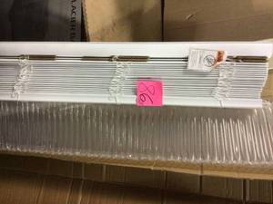 lot 86 image: 34x76x14 in. Linen Filler in Almond by MasterBath in good condition 