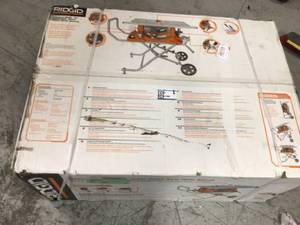 lot 113 image: 10 in. Pro Jobsite Table Saw with Stand by RIDGID in good conditions