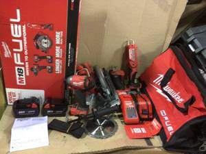 MILWAUKEE M18 FUEL 18-VOLT LITHIUM-ION BRUSHLESS CORDLESS COMBO KIT (4-TOOL) WITH TWO 5.0 AH BATTERIES, 1-CHARGER, 1-TOOL BAG in good condition&nbsp