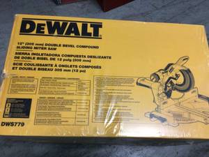 15 Amp Corded 12 in. Double Bevel Sliding Compound Miter Saw, Blade Wrench & Material Clamp by DEWALT not used