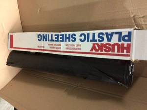 lot 4 image: HUSKY 12 ft. x 100 ft. Black 4 mil Plastic Sheeting in good condition 