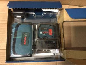 lot 22 image: 100 ft. 5 Self Leveling Plumb and Square Point Laser by Bosch in good condition 