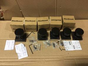 lot 39 image: Pismo Square Matte Black Half-Dummy Door Knob by Kwikset in good condition