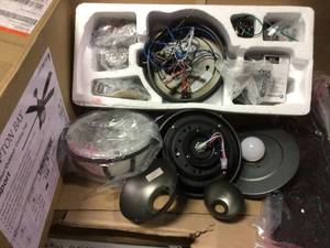 lot 54 image: Seaport 52 in. LED IndoorOutdoor Natural Iron Ceiling Fan with Light Kit by Hampton Bay in good condition